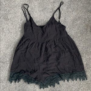 LF flowy black romper with crotchet detailing